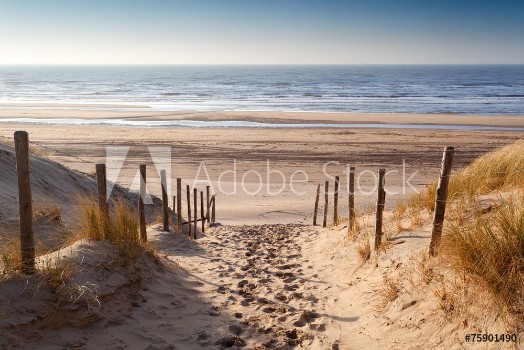 Picture of sand path to North sea at sunset